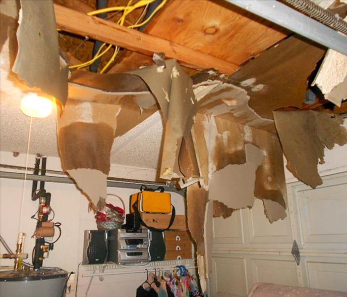 Ceiling is falling down in basement from water damage
